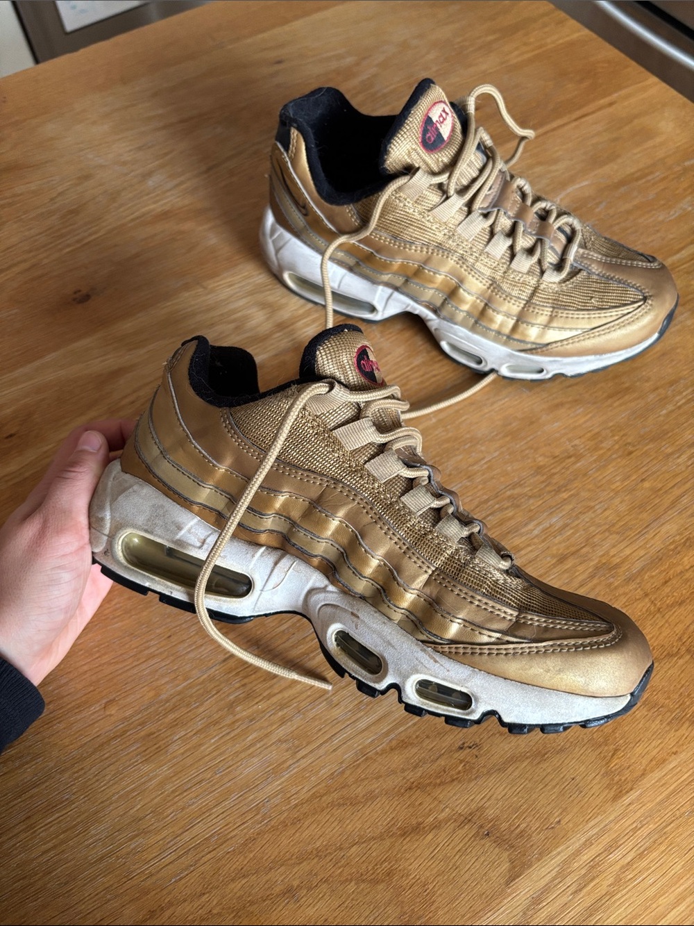 Nike Men’s Gold and Black Air Max 95 Sneakers